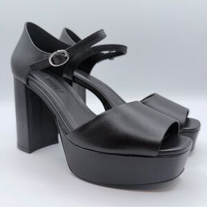 Steve Madden “London” black leather platforms